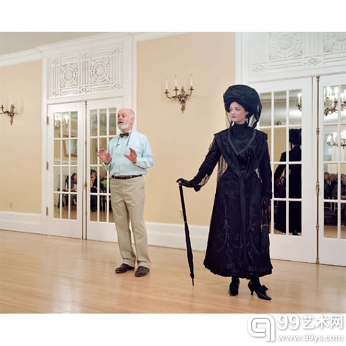 Wall, Jeff: Vancouver, 7 Dec. 2009. Ivan Sayers, costume historian, lectures at the University Women's Club. Virginia Newton- Moss wears a British ensemble c. 1910, from Sayers' collection 